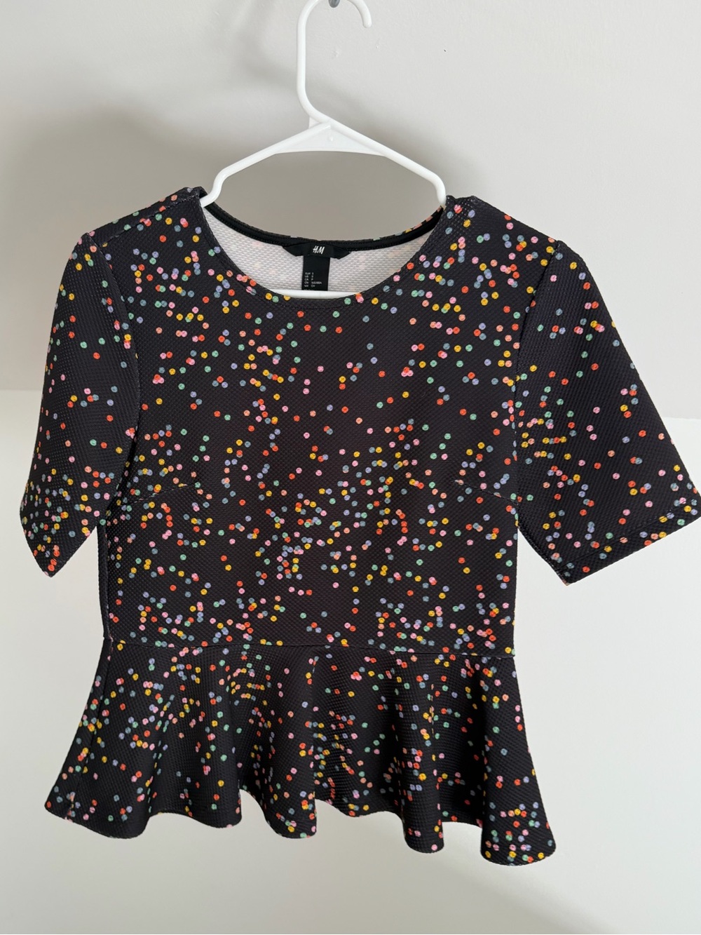 H&M Black Peplum Top with Multicolor Dot Print